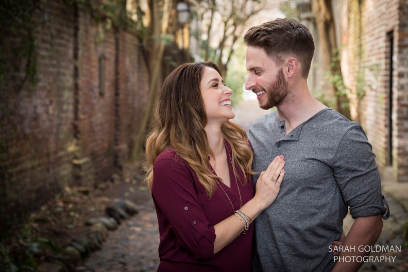 engaged couple during their photo session in Philadelphia alley