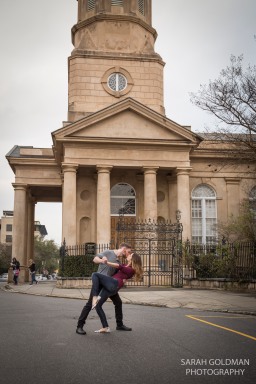 engaged couple on church street in charleston